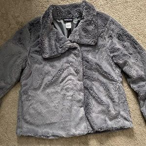 Woman’s Size Large Teddy jacket with adjustable collar . 100% Polyester .